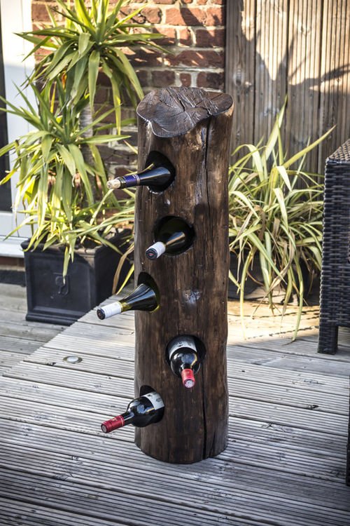 This Guy Made An Awesome Wine Rack Out Of An Old Log
