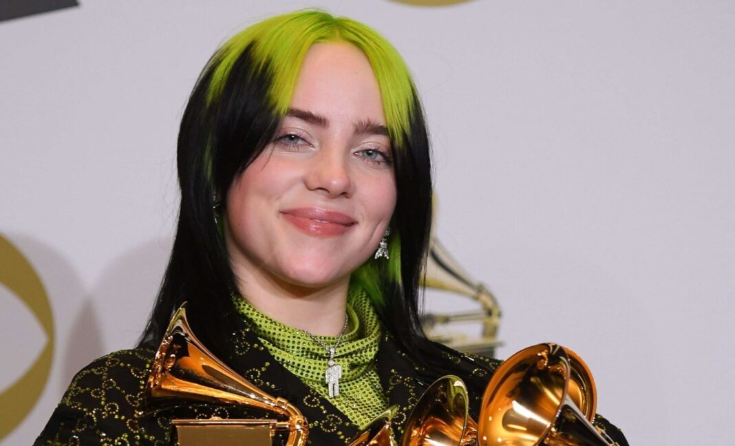 Billie Eilish with her Grammys for Album of the Year, Best New Artist, Best Pop Solo Performance, Best Pop Vocal Album, and Record of the Year at the Grammy Awards in January 2020.